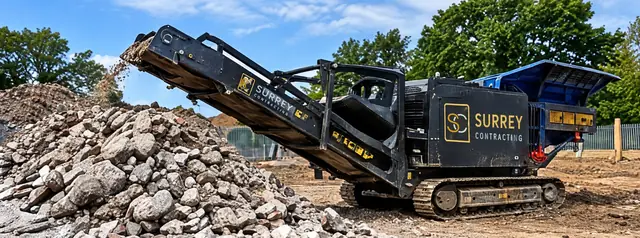 Surrey Contracting tracked crusher processing rubble on site